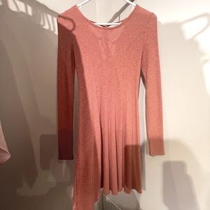 Super cute blush colored rubbed long sleeve dress with open tie back
